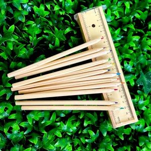 12 Wooden color pencils with wooden storage box. Box is a ruler that detaches.